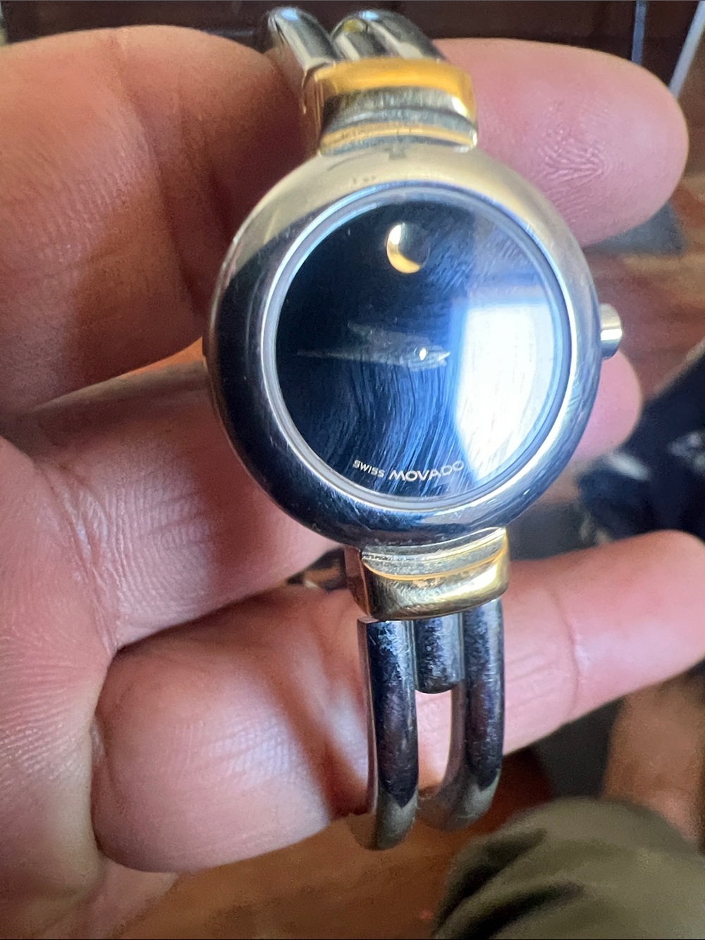 Movado model 97 A1809A Two-Tone Black Dial Silver and Gold Bracelet Watch